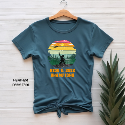Retro Bigfoot T-Shirt Funny Hide and Seek Champion Graphic Tee Sasquatch Silhouette Sunset Forest Shirt Vintage Cryptid Lover Gift