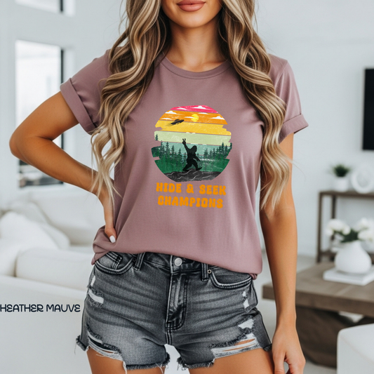 Retro Bigfoot T-Shirt Funny Hide and Seek Champion Graphic Tee Sasquatch Silhouette Sunset Forest Shirt Vintage Cryptid Lover Gift